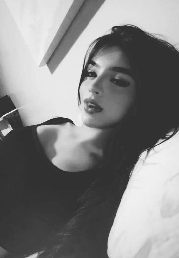 Adult woman from Venezuela in a late-night video chat portrait