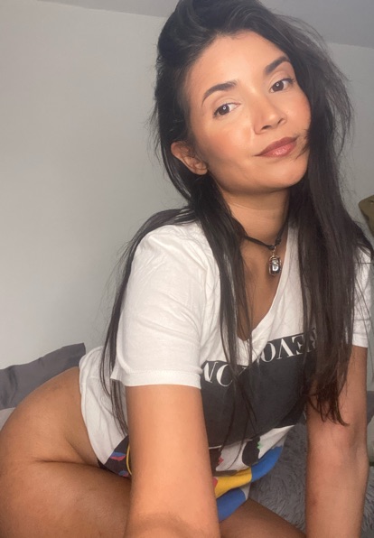 Adult woman from Venezuela in a late-night video chat portrait