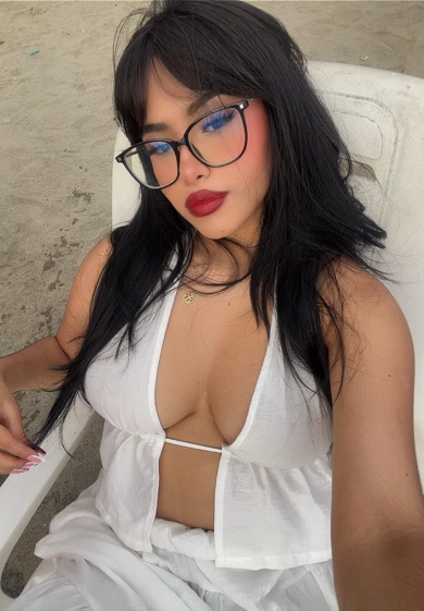 Adult woman from Venezuela in a late-night video chat portrait